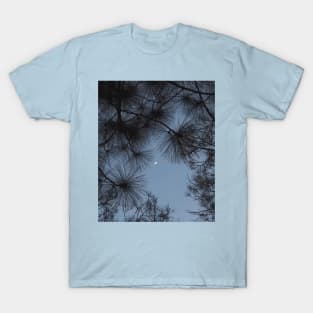 Bright moon shining through lush tree at night T-Shirt